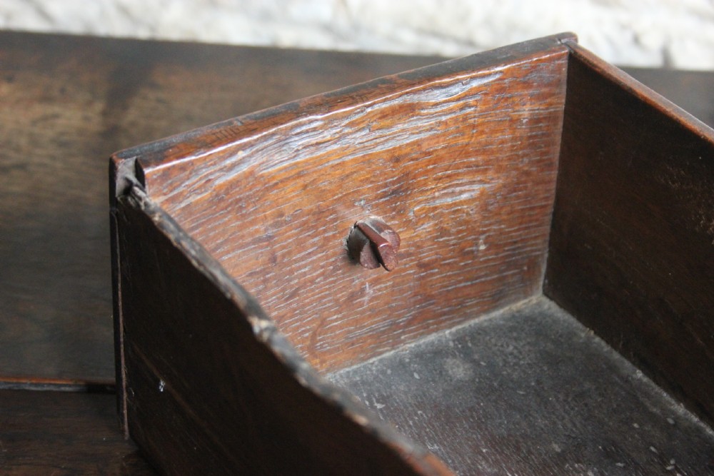 An Unusual 18th century oak lowboy  View II