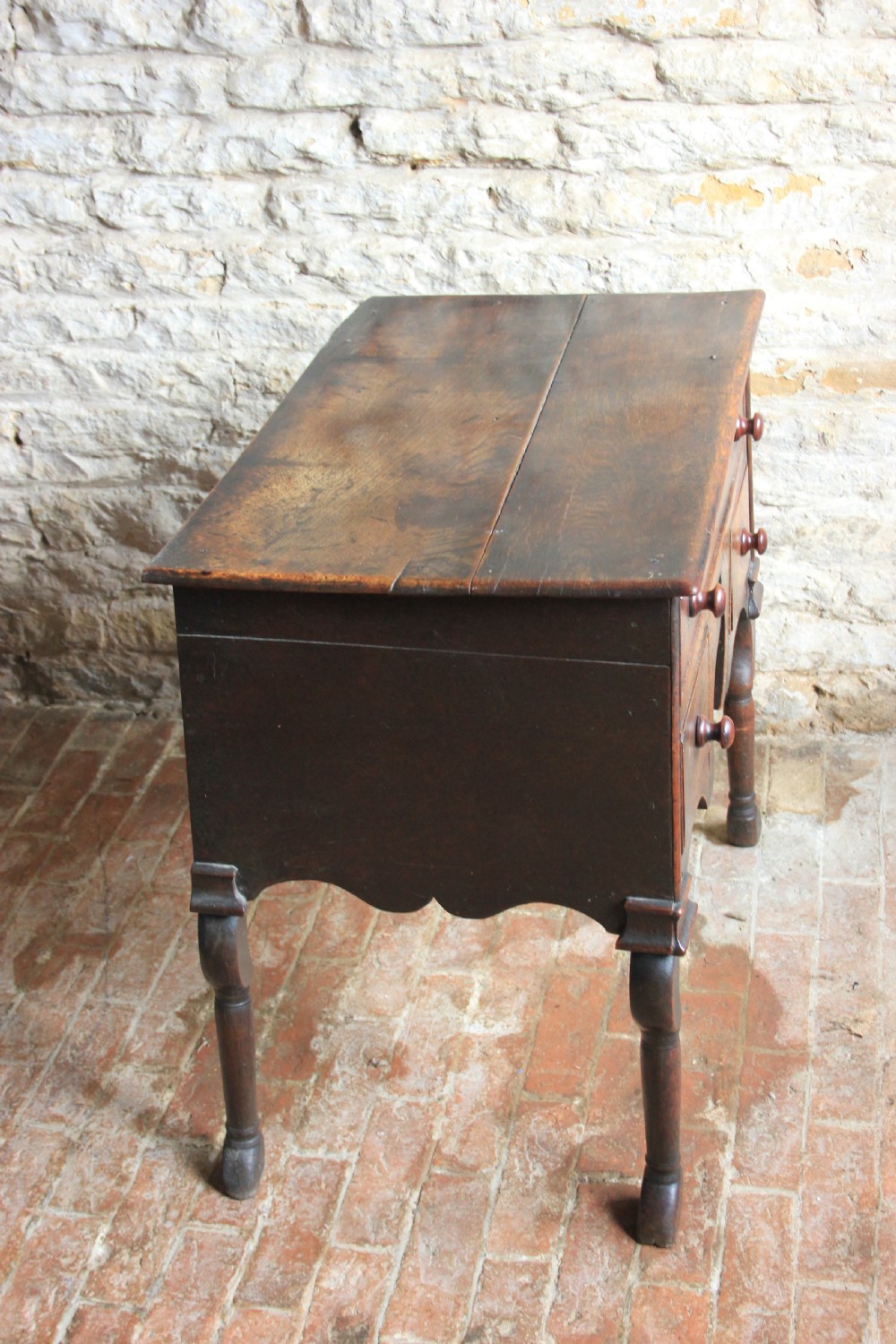 An Unusual 18th century oak lowboy  View III