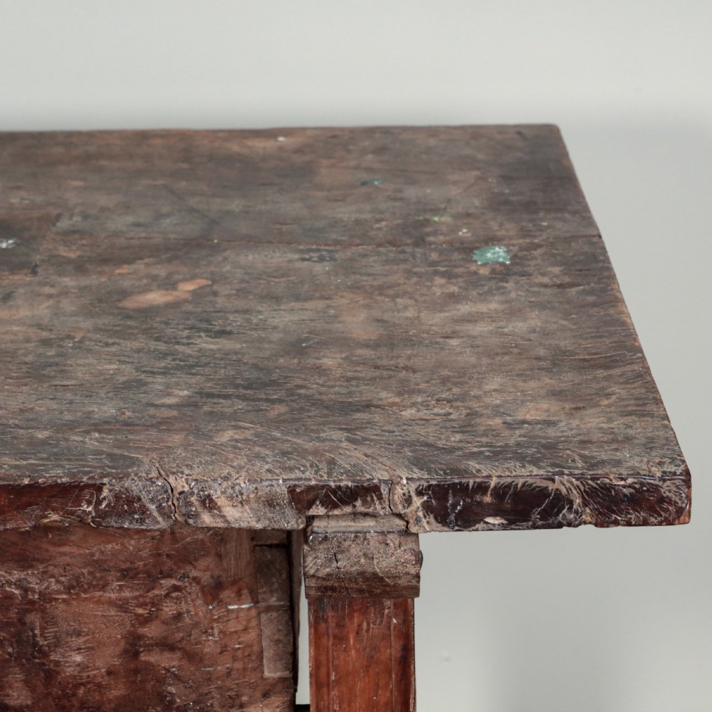 A 17th-century Spanish timber console table featuring two carved drawer fronts with iron ring handles. View VI