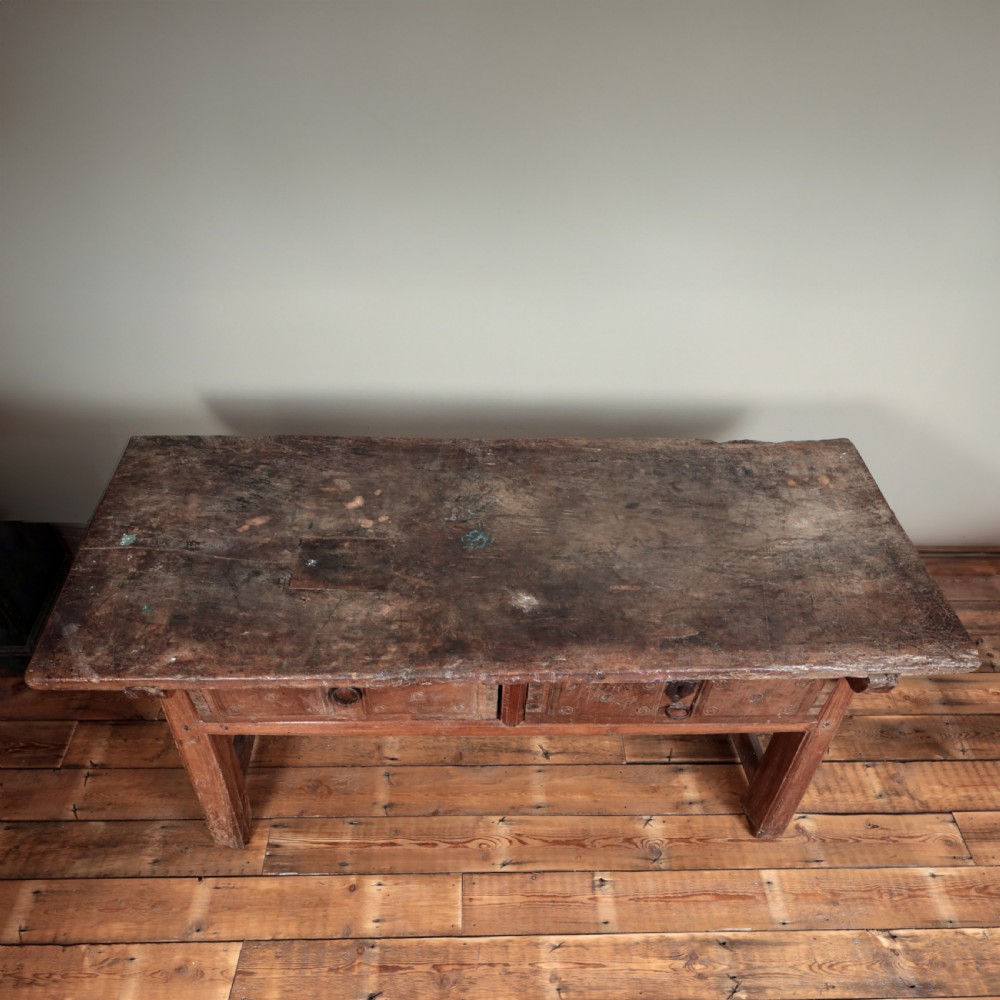 A 17th-century Spanish timber console table featuring two carved drawer fronts with iron ring handles. View XIII