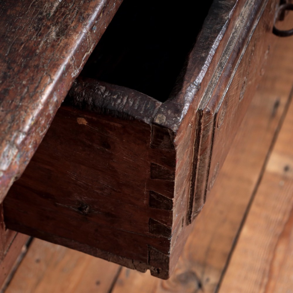 A 17th-century Spanish timber console table featuring two carved drawer fronts with iron ring handles. View XXVIII