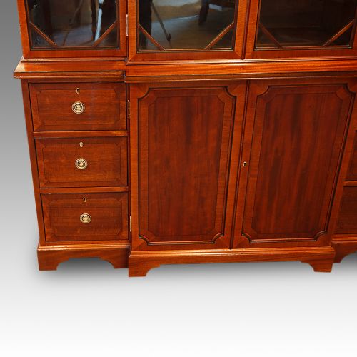fig 1. Maple & Co. mahogany breakfront bookcase