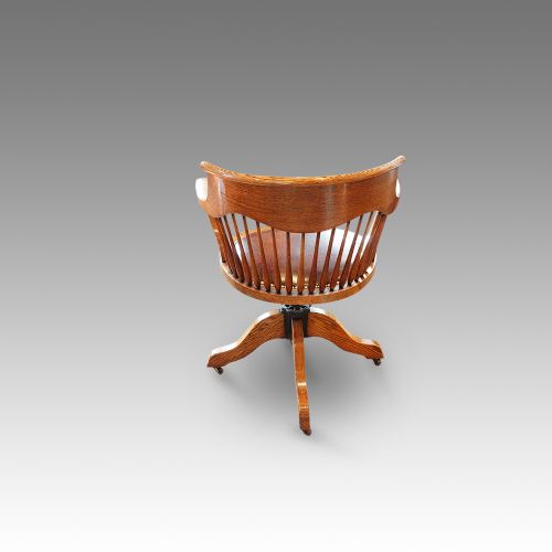 fig 2. Edwardian oak spindle back revolving desk chair