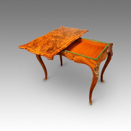 fig 1. Victorian serpentine inlaid walnut card table