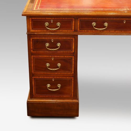 fig 1. Edwardian inlaid mahogany pedestal desk