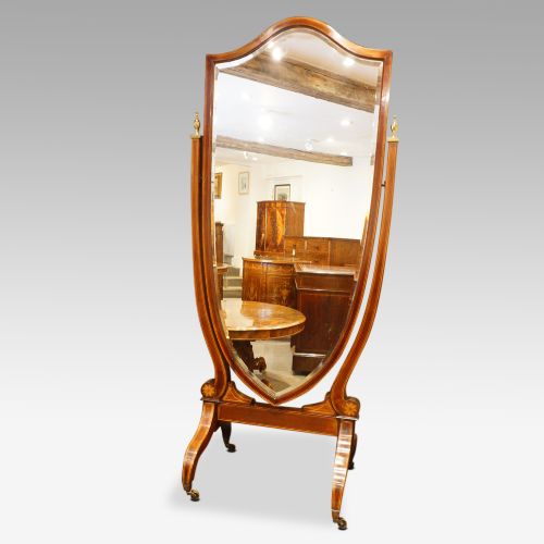 fig 1. Edwardian inlaid mahogany shield shape cheval mirror