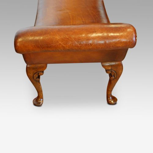 fig 2. Walnut and leather window seat in the Queen Anne style