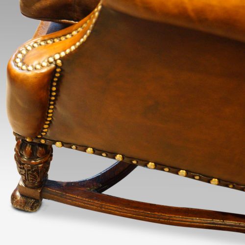 fig 4. Pair of carved oak and leather wing chairs