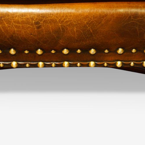 fig 5. Pair of carved oak and leather wing chairs