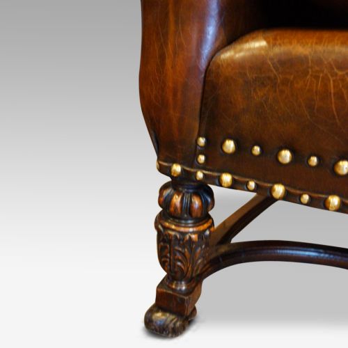 fig 8. Pair of carved oak and leather wing chairs
