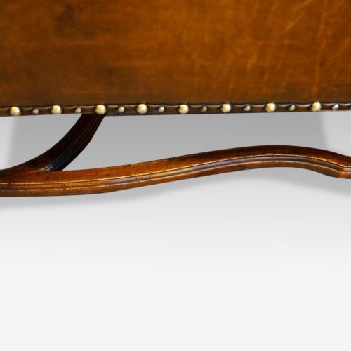 fig 9. Pair of carved oak and leather wing chairs