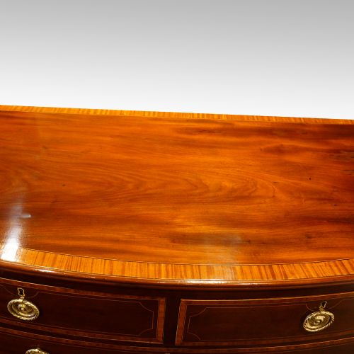 fig 4. Georgian inlaid bow front chest