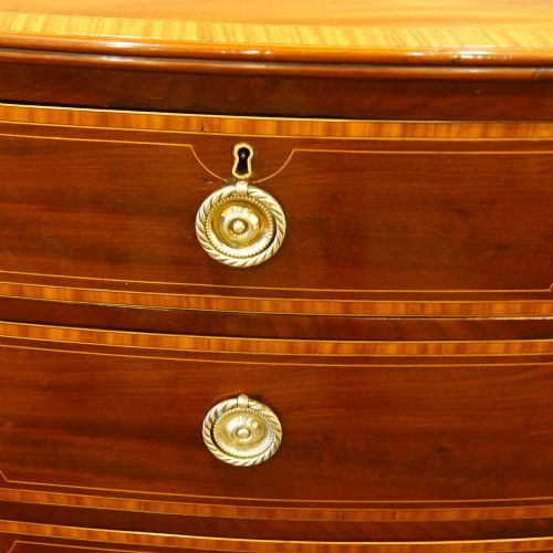 fig 6. Georgian inlaid bow front chest