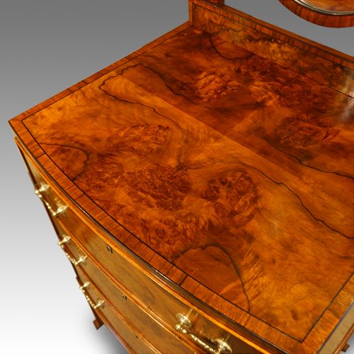fig 2. Walnut bow front dressing chest