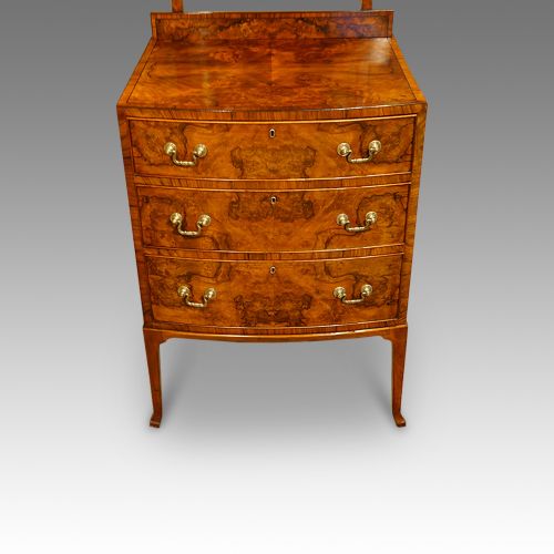 fig 5. Walnut bow front dressing chest