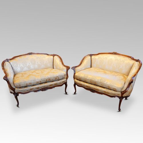 fig 4. Pair of Edwardian walnut small sofas