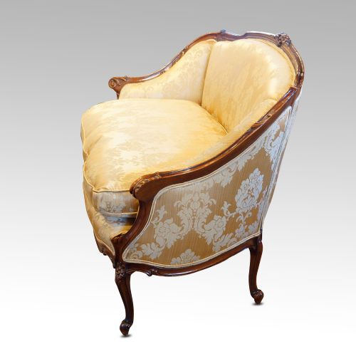 fig 6. Pair of Edwardian walnut small sofas