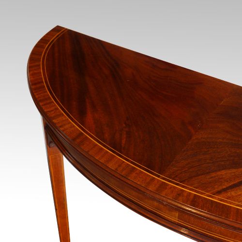 fig 3. Pair of Edwardian mahogany demi lune tables