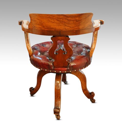fig 7. Victorian walnut revolving desk chair