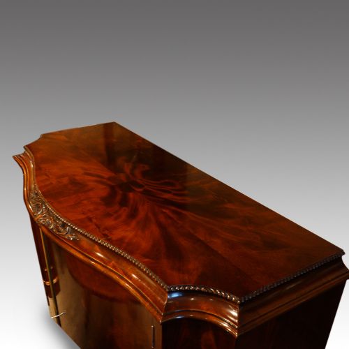 fig 9. Maple & co Edwardian serpentine mahogany sideboard