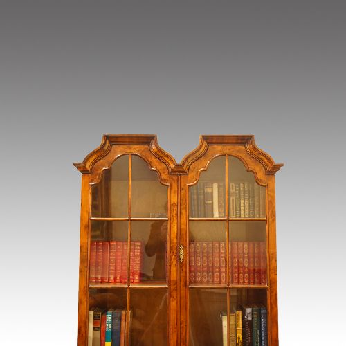 fig 4. George V walnut double dome bookcase