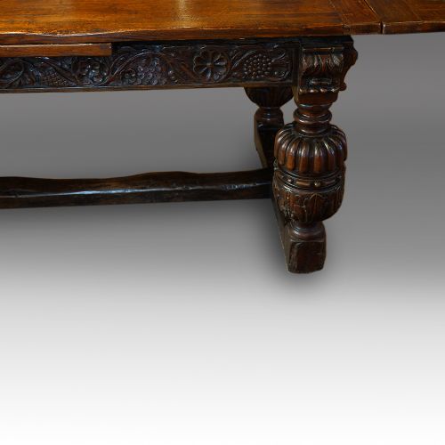 fig 1. Antique oak large draw leaf dining table