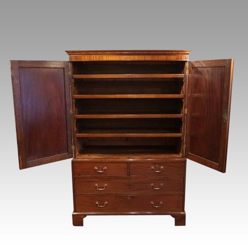 fig 7. George III mahogany linen press