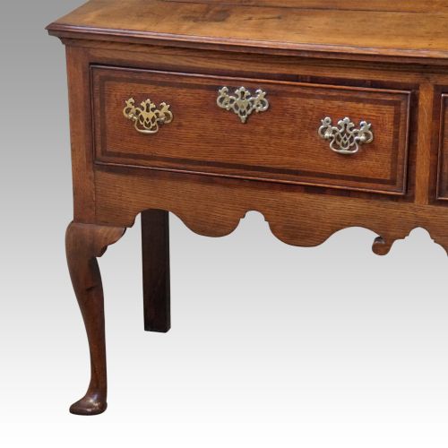 fig 6. Georgian oak cabriole leg dresser base