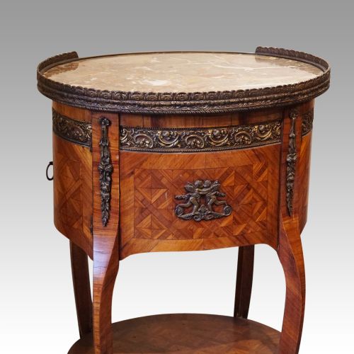 fig 3. Pair of Continental parquetry oval cabinets