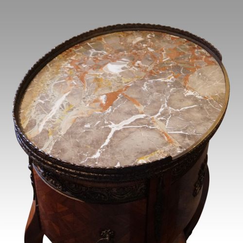 fig 4. Pair of Continental parquetry oval cabinets