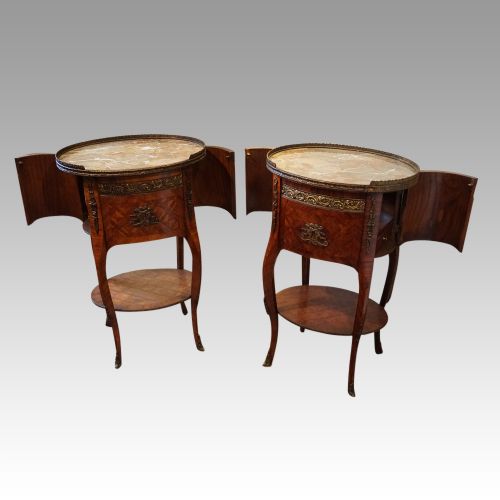 fig 5. Pair of Continental parquetry oval cabinets