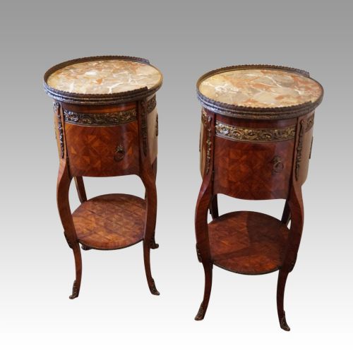 fig 6. Pair of Continental parquetry oval cabinets