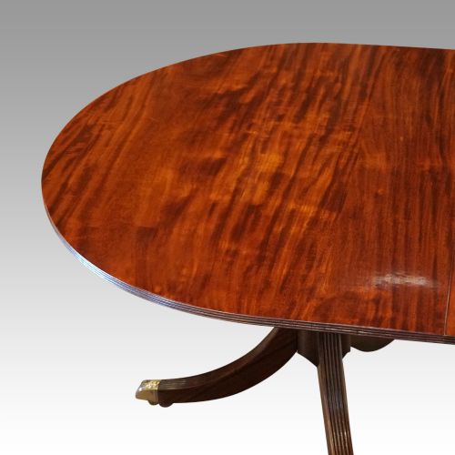 fig 7. Regency style mahogany twin pillar dining table