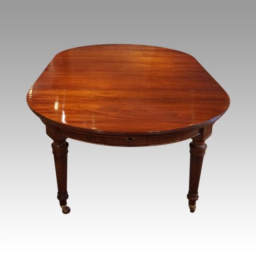 fig 3. Edwardian mahogany circular extending dining table
