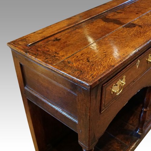 fig 4. Georgian oak inlaid dresser base