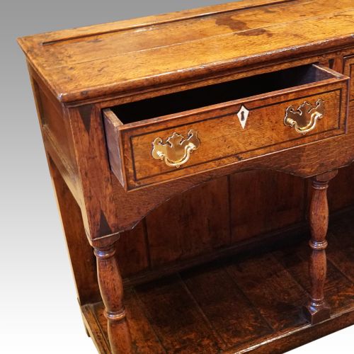 fig 5. Georgian oak inlaid dresser base