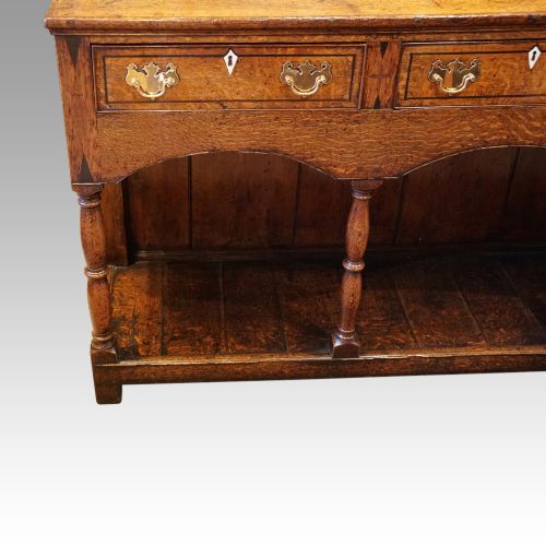 fig 6. Georgian oak inlaid dresser base
