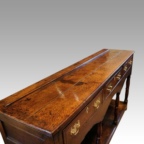 fig 8. Georgian oak inlaid dresser base
