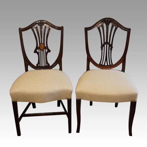fig 1. Harlequin set of 14 dining chairs