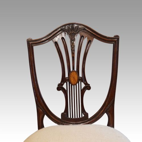 fig 2. Harlequin set of 14 dining chairs