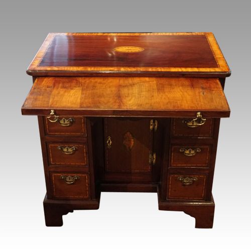 fig 6. George III inlaid kneehole