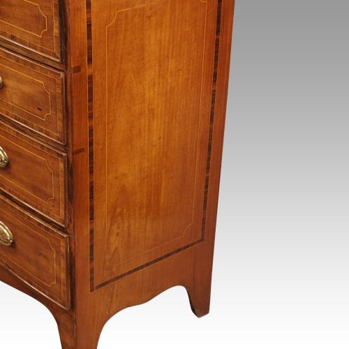 fig 3. Regency inlaid bow fronted chest