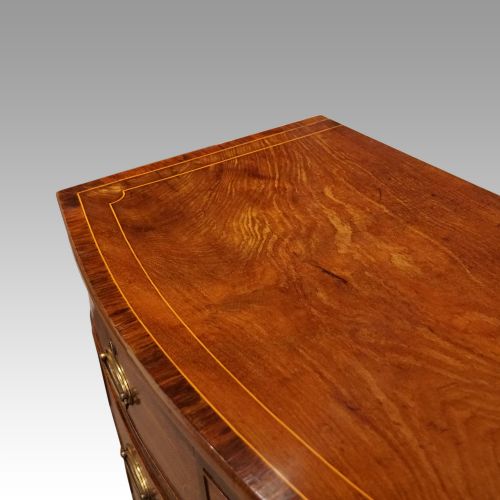 fig 6. Regency inlaid bow fronted chest
