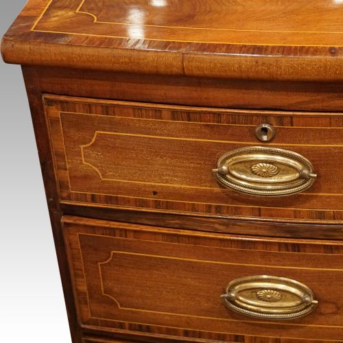fig 7. Regency inlaid bow fronted chest