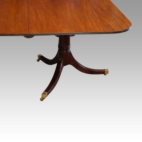 fig 2. George V mahogany twin pillar dining table