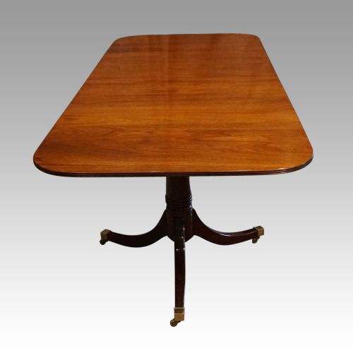 fig 3. George V mahogany twin pillar dining table