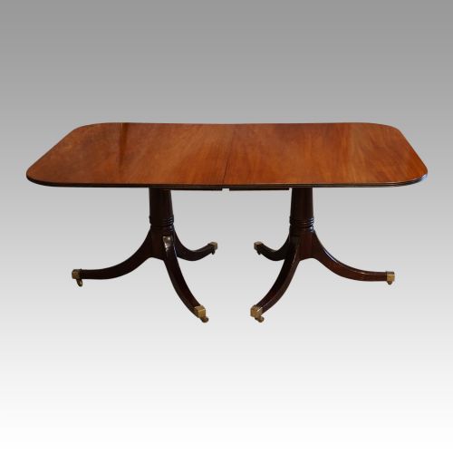 fig 4. George V mahogany twin pillar dining table