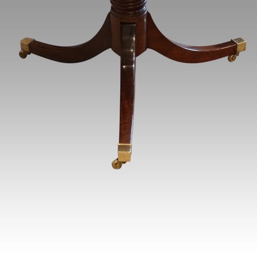 fig 6. George V mahogany twin pillar dining table