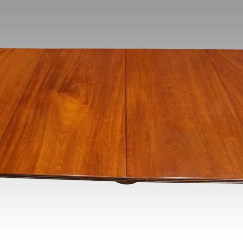 fig 8. George V mahogany twin pillar dining table