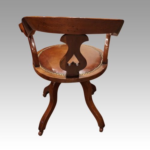 fig 1. Victorian mahogany revolving desk chair